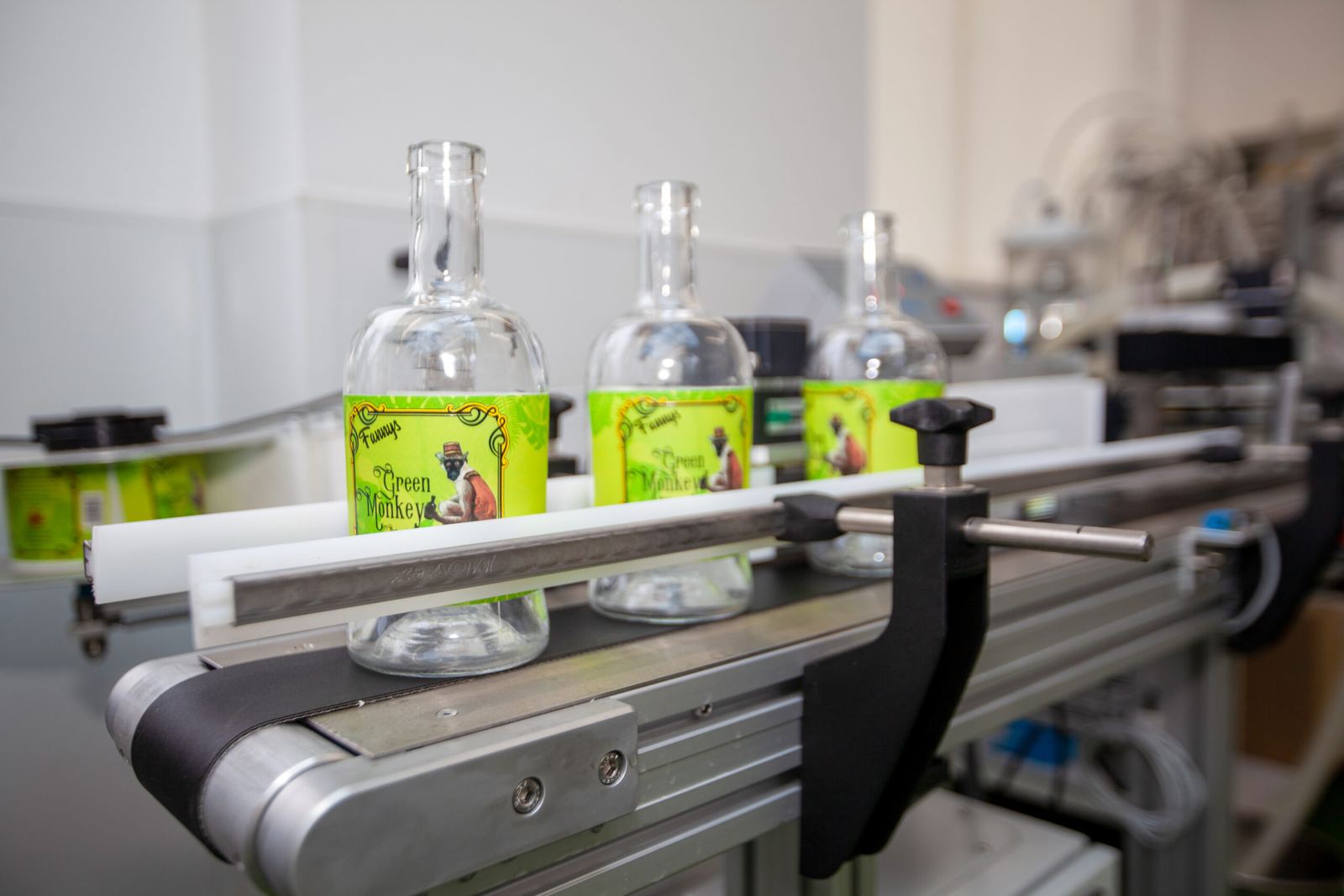 Green Monkey bottles on the bottling line at Fanny's Distillery
