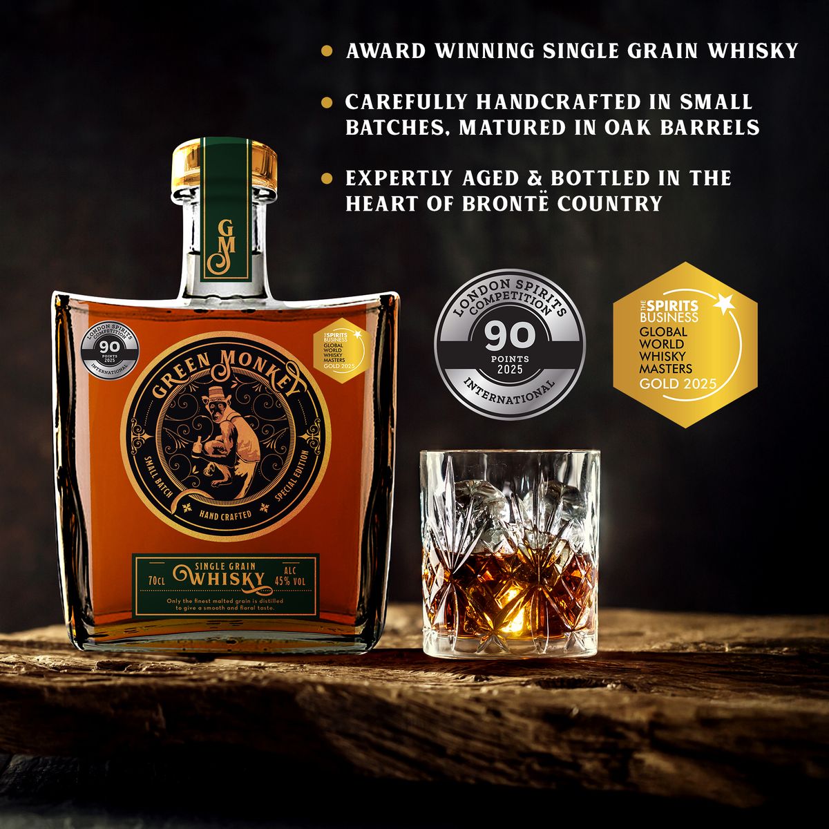 Green Monkey Single Grain Whisky bottle in a barley field